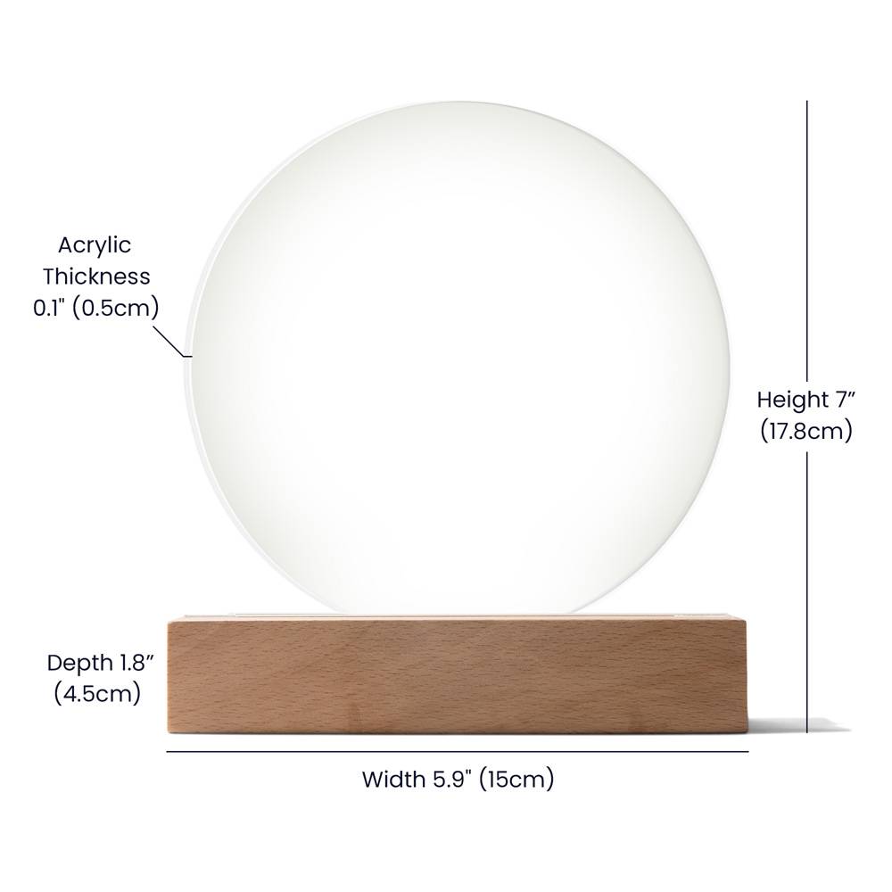 White spherical object on a wooden base with measurements indicated