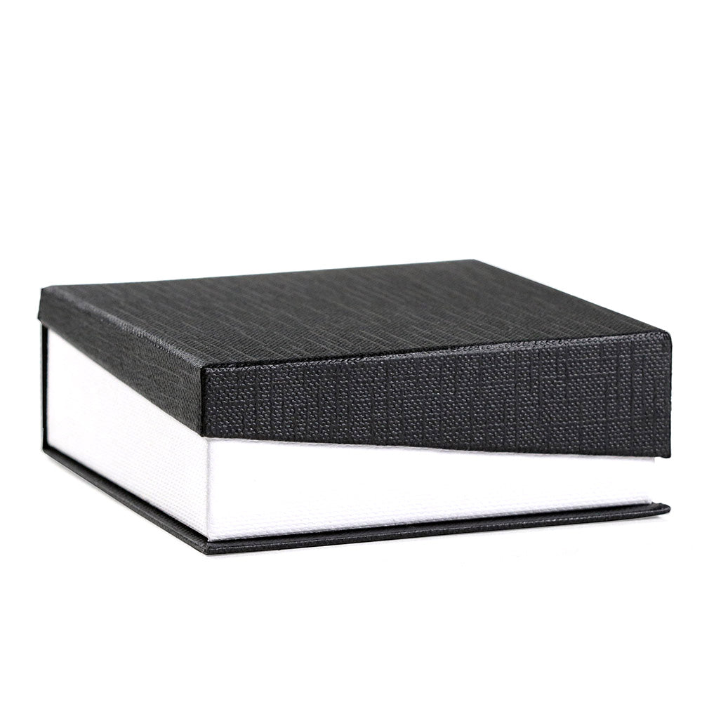 Black textured box with a white interior on a white background